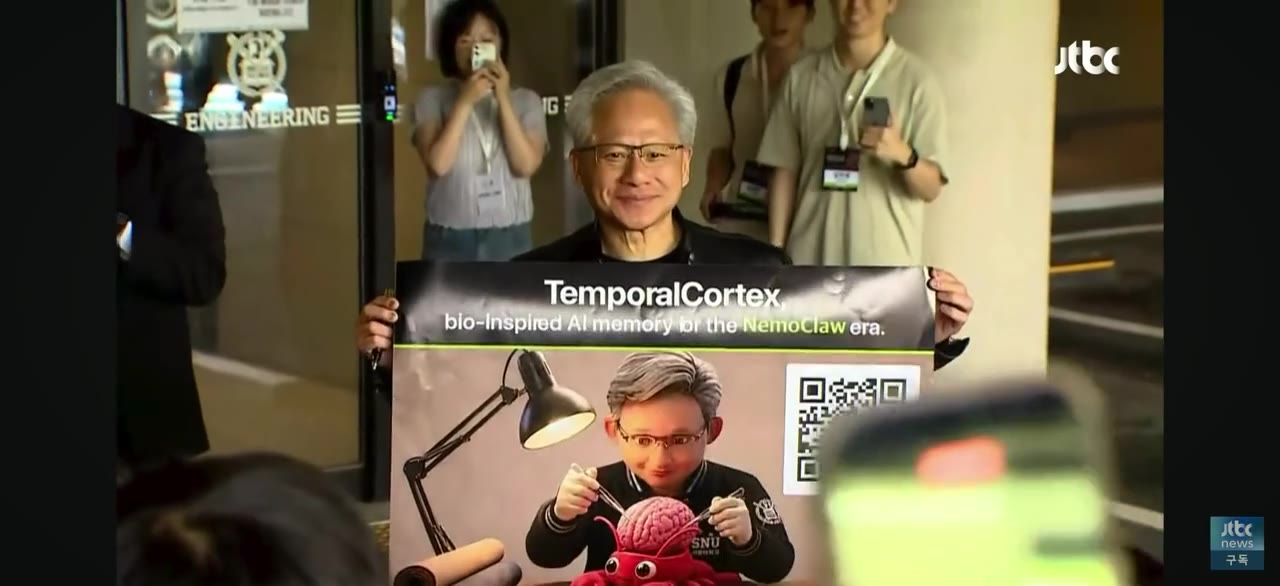 Jensen Huang holding the TemporalCortex poster